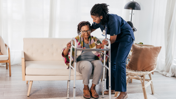 woman helping an elderly