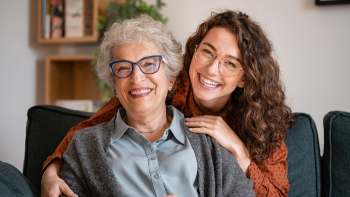 two ladies smiling