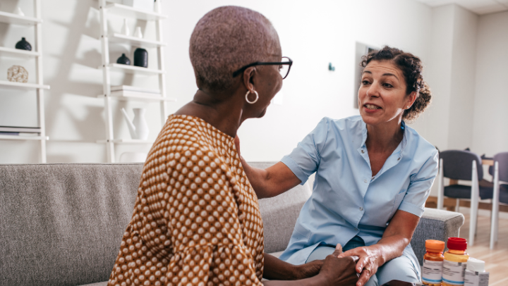 caregiver and senior talking