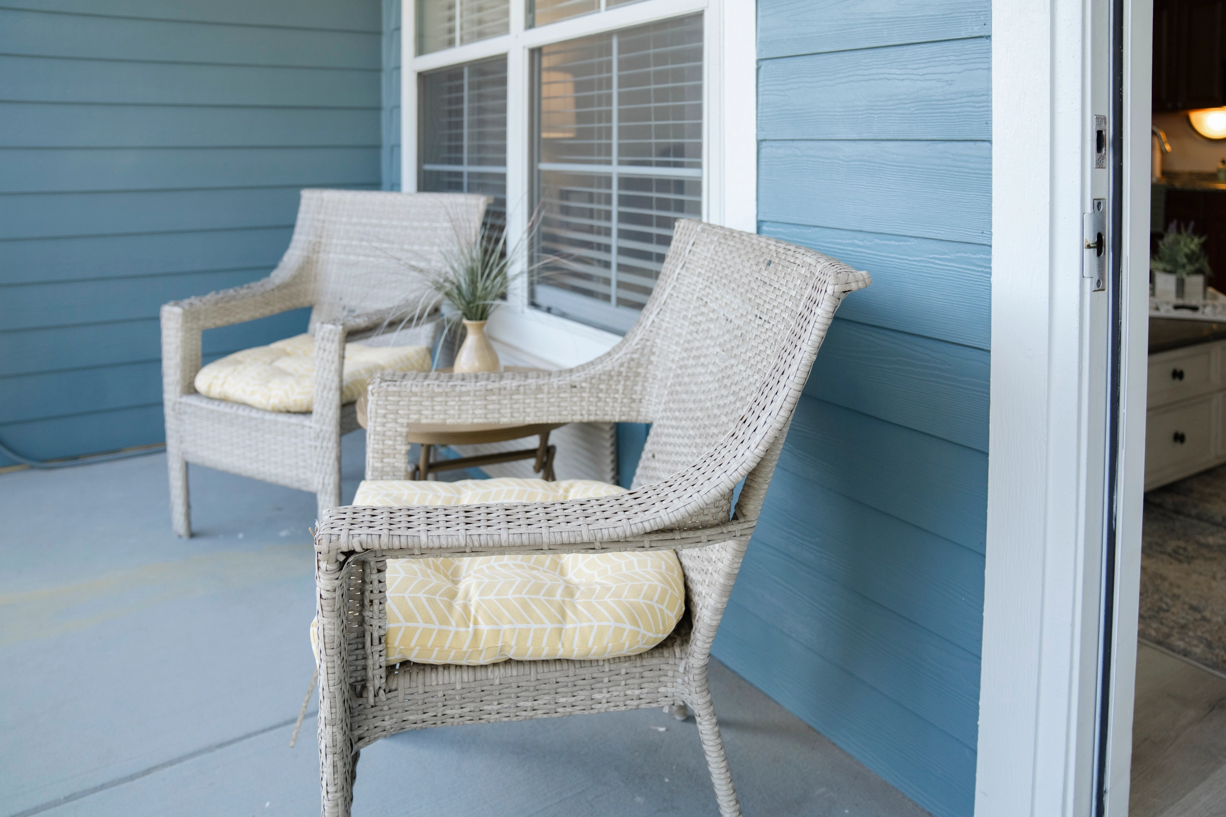 Private patio with outdoor seating and table