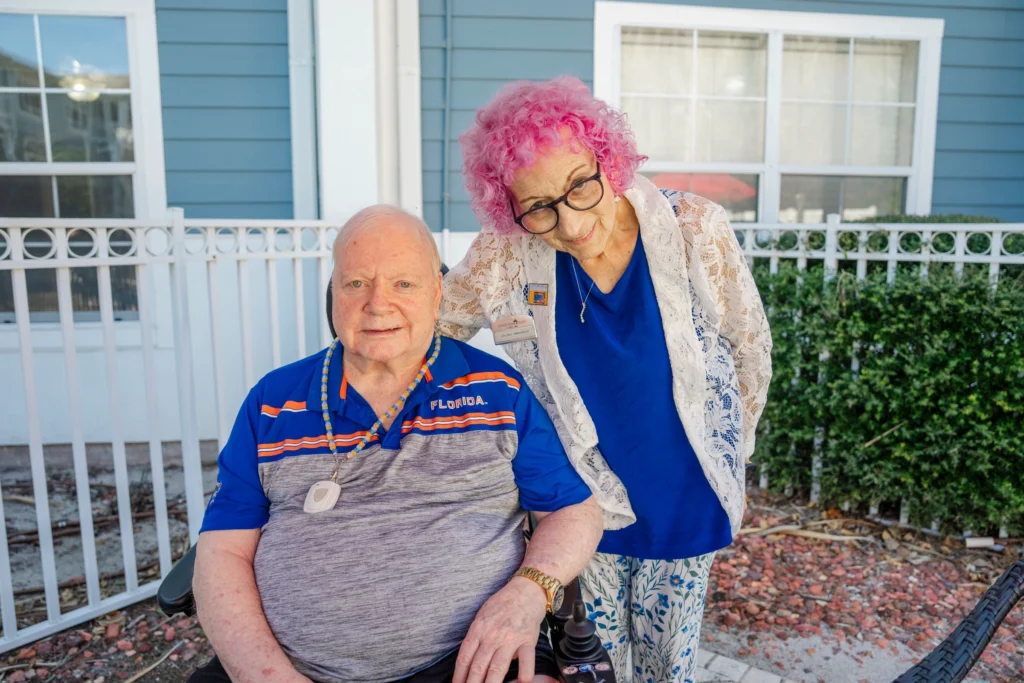 Man and woman with pink hair